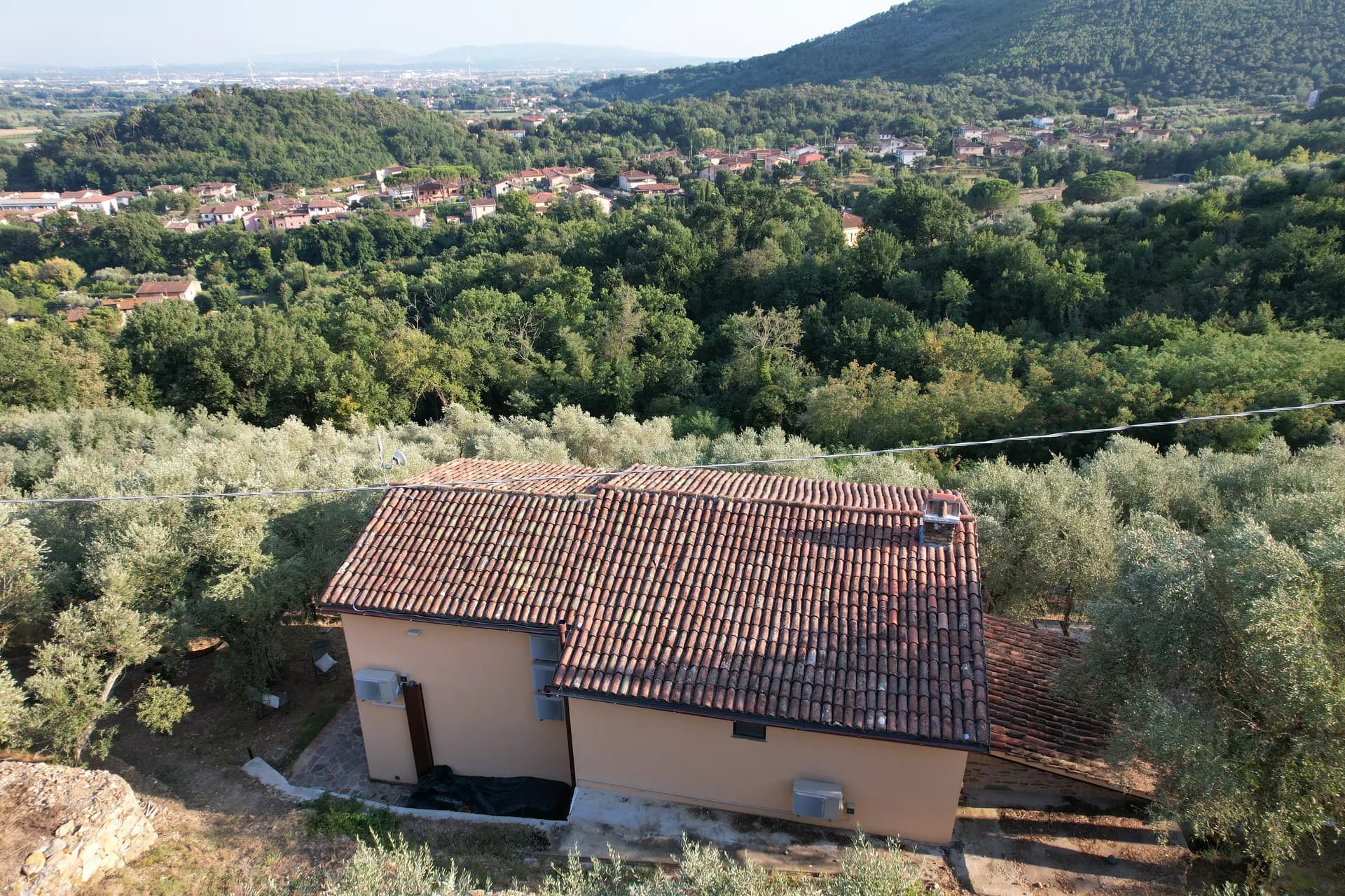 Timber shutters and stone walls at Casale Eleo