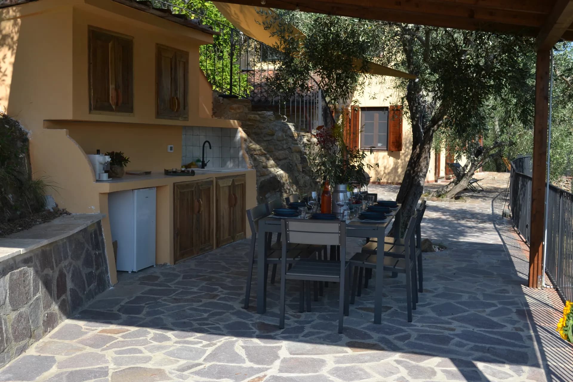 The pool deck and loungers at Casale Eleo