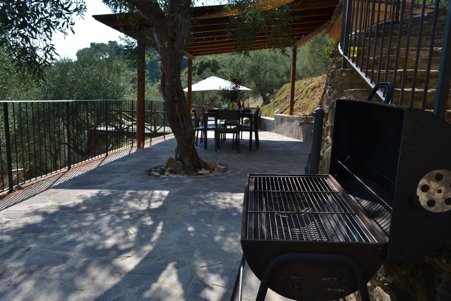 The pool deck and loungers at Casale Eleo