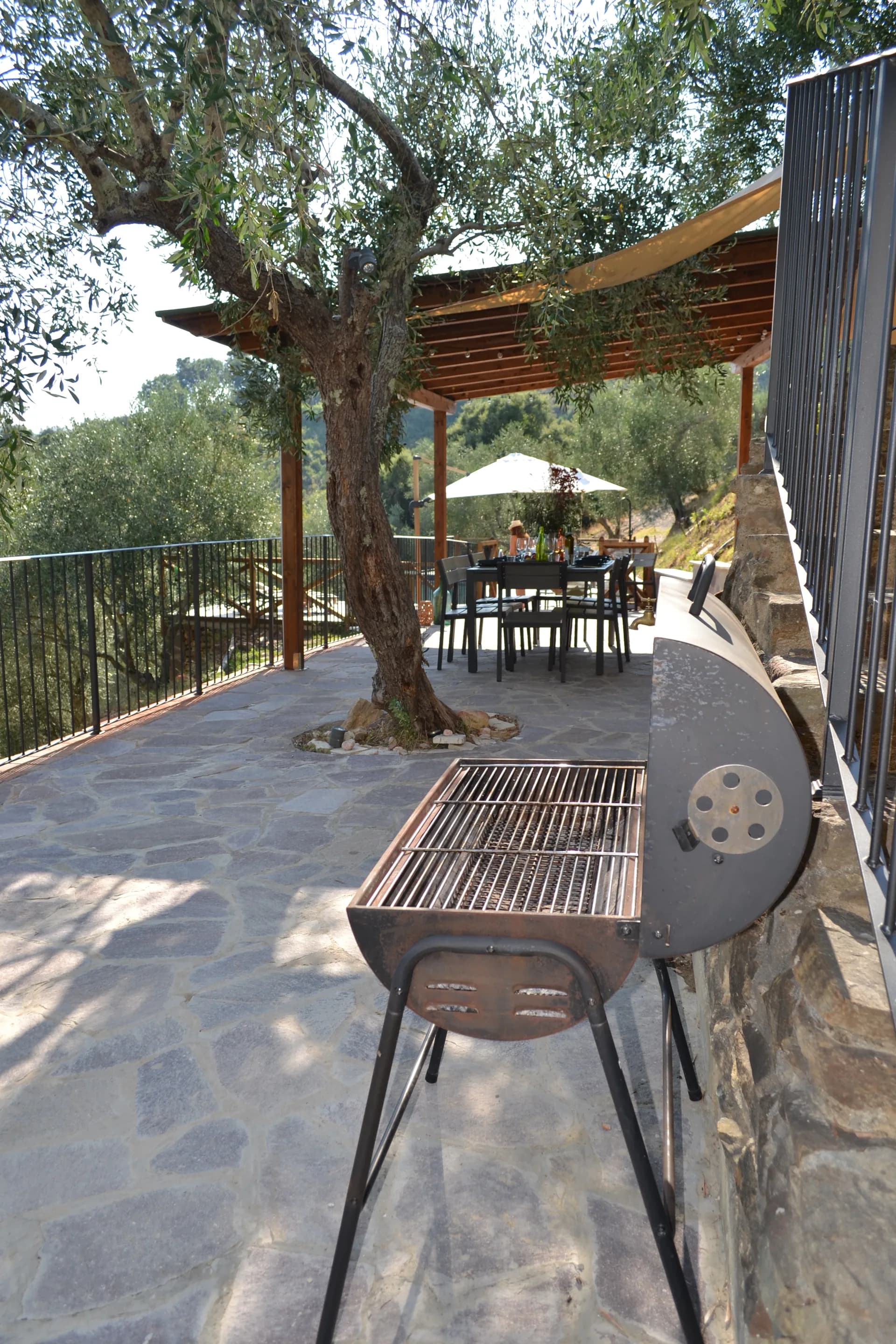 The pool deck and loungers at Casale Eleo