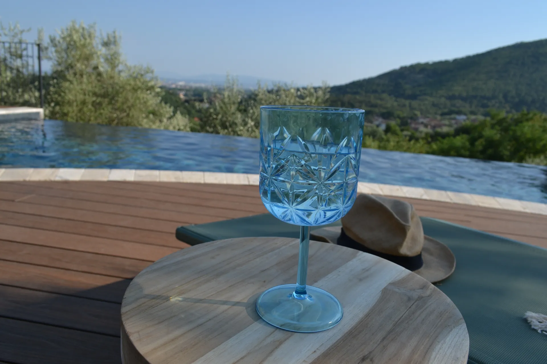 The pool deck and loungers at Casale Eleo