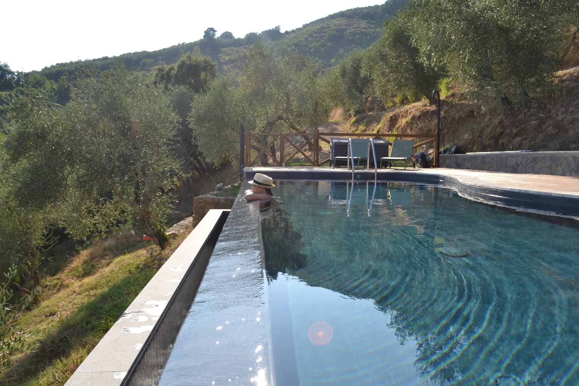 The pool deck and loungers at Casale Eleo